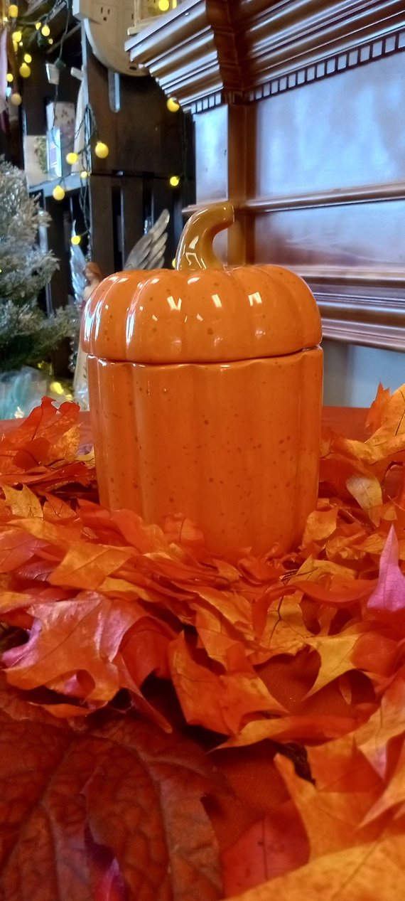 Orange pumpkin candle